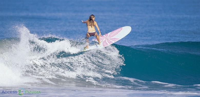 Surfer in Panama riding a wave break